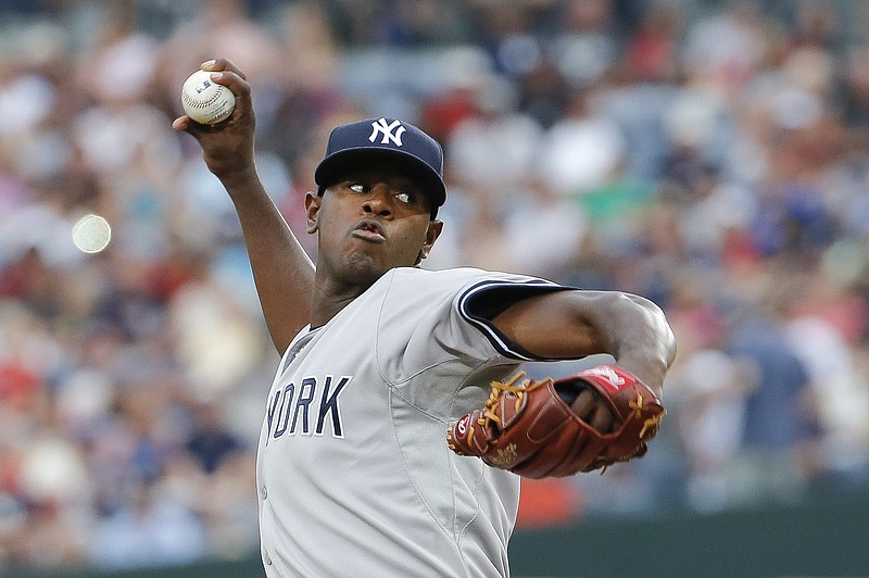 New York Yankees starting pitcher Luis Severino (40) works in the first inning of a baseball game against the Atlanta Braves Saturday, Aug. 29, 2015, in Atlanta. 