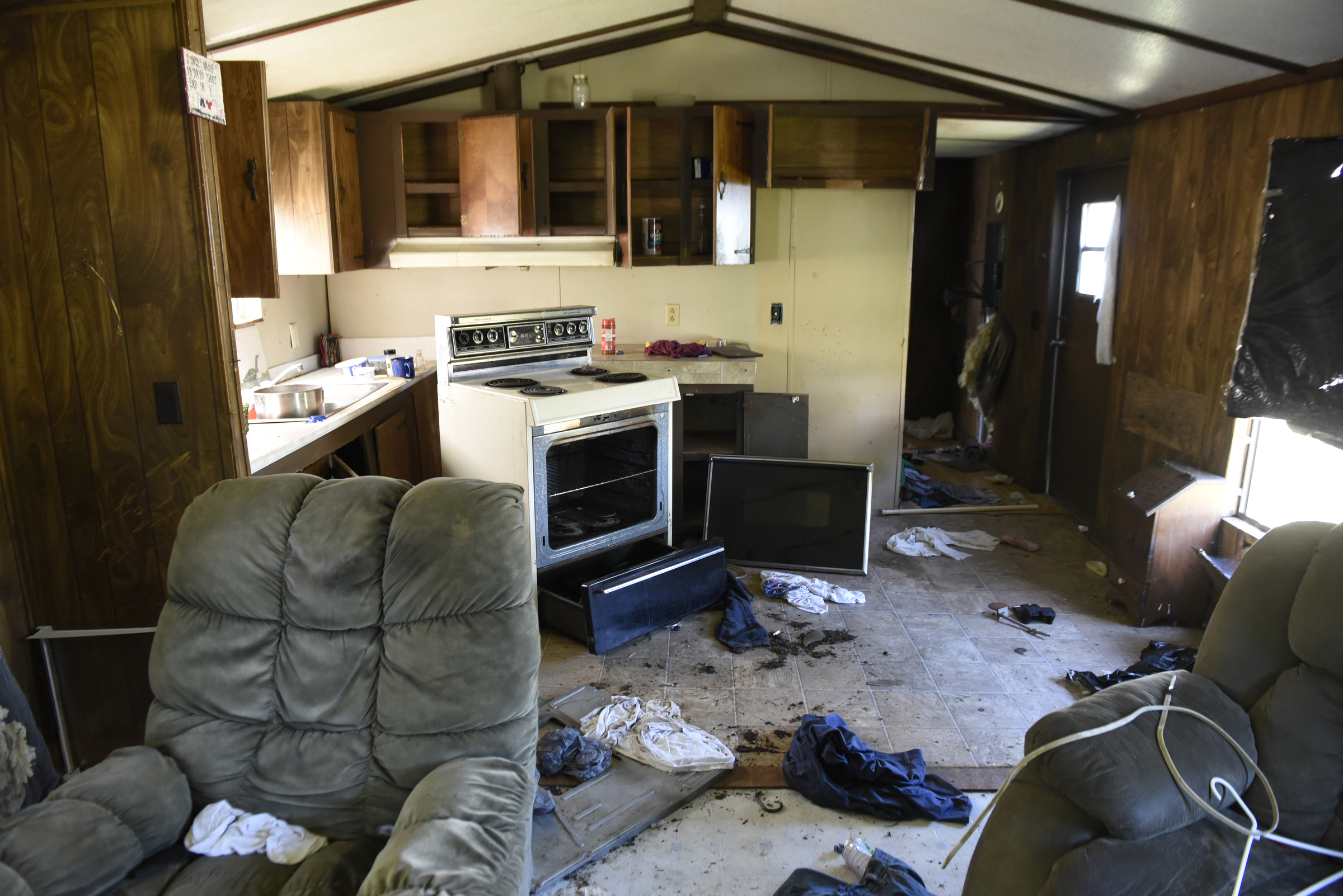 Disorder is seen inside this abandoned unit at the Pear Pines Mobile Home Park on Tuesday, Aug. 25, 2015, in LaFayette, Ga.