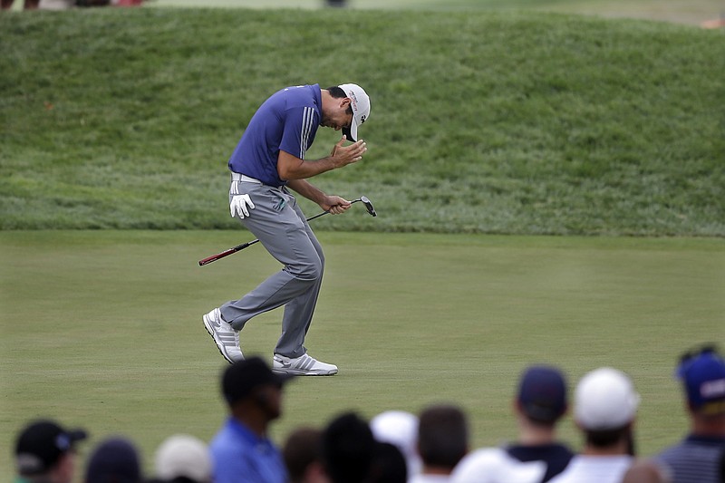 
              Jason Day, of Australia, reacts to his missed putt on the eighth hole during the final round of play at The Barclays golf tournament Sunday, Aug. 30, 2015, in Edison, N.J. (AP Photo/Mel Evans)
            