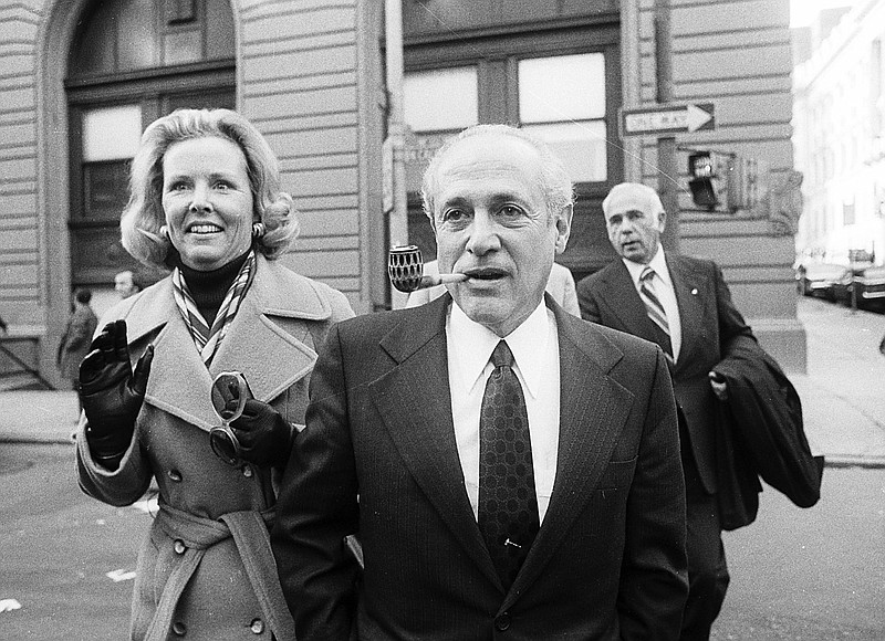 
              File-This Oct. 6, 2001, file photo shows Gov. Marvin Mandel, accompanied by his wife, Jeanne, walking to the federal courthouse in Baltimore.  Mandel, whose 26-year career in state government ended with his 1977 conviction on political corruption charges, has died. He was 95. According to a statement from his family, Mandel passed away Sunday, Aug. 30, 2015, after spending two days with family while celebrating his son's 50th birthday. Once considered one of Maryland's most powerful and effective governors, Mandel presided over a major reorganization of state government, built a subway in Baltimore and spent $1 billion on school construction. But his accomplishments were overshadowed by his personal tribulations, which included his trial and a messy divorce when he moved out of the governor's mansion, leaving his first wife behind so he could marry another woman. (AP Photo/Bill Smith)
            