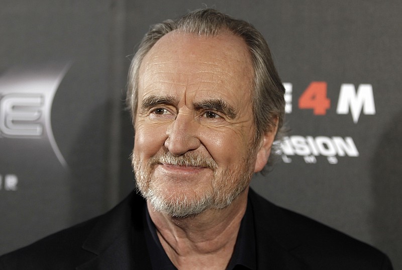 Director Wes Craven arrives at the premiere of "Scream 4" in Los Angeles on Monday, April 11, 2011. "Scream 4" opens in theaters April 15.