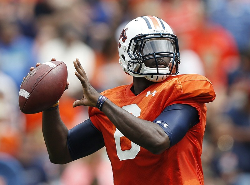Auburn quarterback Jeremy Johnson (6) looks to pass during the first half during their spring NCAA college football game, Saturday, April 18, 2015, in Auburn, Ala. (AP Photo/Brynn Anderson)