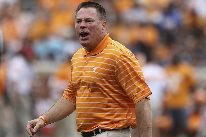 Staff Photo by Dan Henry / The Chattanooga Times Free Press- 4/25/15. The University of Tennessee's head coach Butch Jones calls drills during the Dish Orange & White Game in Knoxville on Saturday, April 25, 2015.