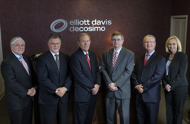 Staff photo by Doug Strickland / Among the management team for accounting firm Elliott Davis Decosimo are, from left, Nick Decosimo, office managing shareholder for Chattanooga and executive committee member; accounting resources director John DeMoss; shareholder John Henegar; shareholder Tom Eiseman; shareholder and litigation services leader Mike Costello; and shareholder and executive committee member Renee Ford.