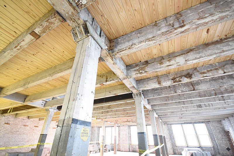 Old and new wood are exposed as construction continues inside the former Fleetwood Coffee building at the corner of King Street and East 11th in downtown Chattanooga. The five story structure was erected in 1906. This photo was taken July 1, 2015.