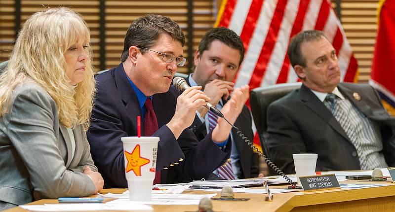 Democratic Rep. Mike Stewart raises questions about a bill to allow people with handgun carry permits to store firearms in their vehicles no matter where they are parked during a 2013 House Civil Justice Committee meeting in Nashville