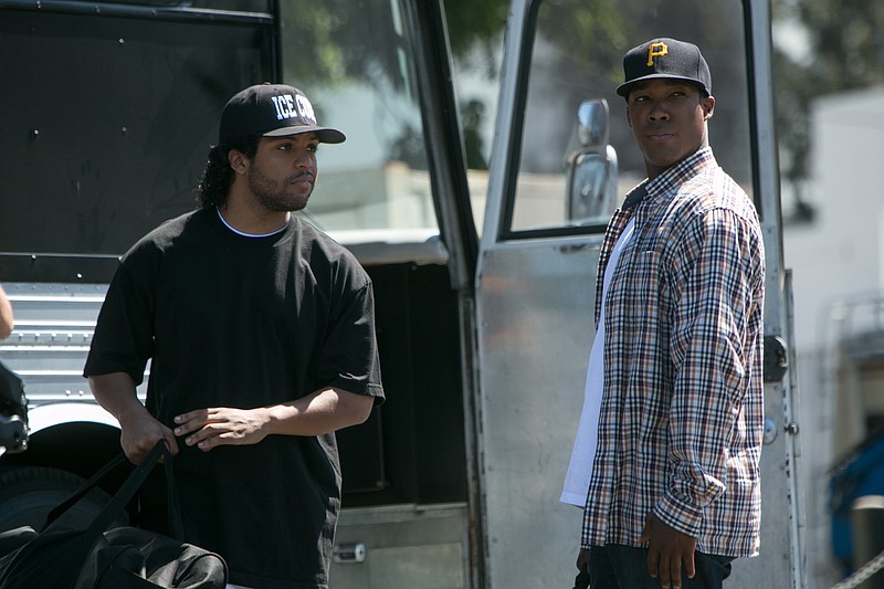 
              This photo provided by Universal Pictures shows, O’Shea Jackson, Jr., left, as Ice Cube and Corey Hawkins as Dr. Dre, in the film, “Straight Outta Compton."  (Jaimie Trueblood/Universal Pictures via AP)
            