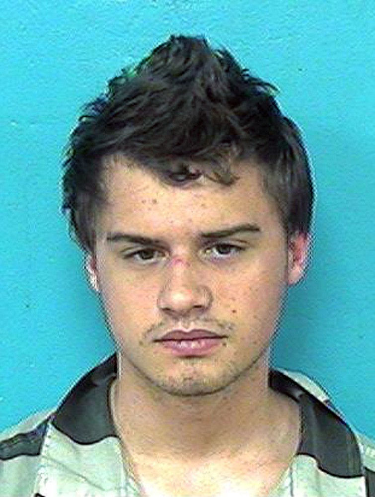 
              This photo provided by the Sullivan County Sheriff’s Office shows Robert Seth Denton. Outfitted in camouflage and armed with a high-powered rifle and 100 rounds of ammunition, Denton fatally shot his mother, step-father and grandmother while six children witnessed the carnage in the family's double-wide mobile home in eastern Tennessee, a sheriff said Monday, Aug. 31, 2015. (Sullivan County Sheriff via AP)
            