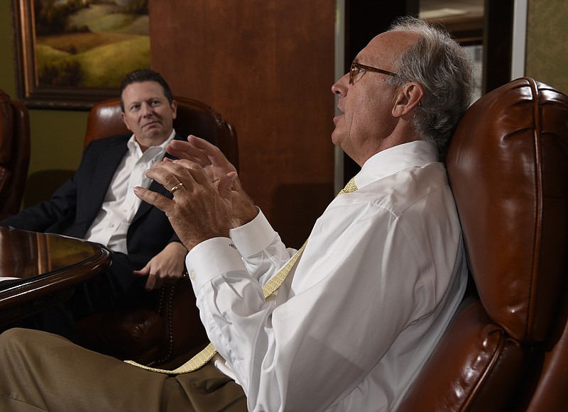 Billy Carroll, president and CEO of SmartFinancial, left, and Miller Welborn, chairman of SmartFinancial, speak during an interview in the offices of Cornerstone Bank onTuesday, Sept. 1, 2015, in Chattanooga, Tenn. 