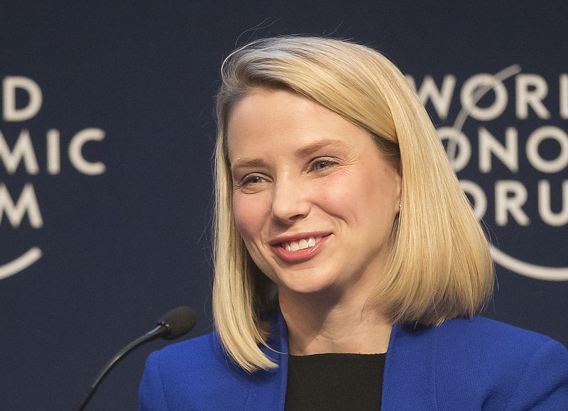 
              FILE - In this Wednesday, Jan. 22, 2014, file photo, Yahoo CEO Marissa Mayer smiles during a session at the World Economic Forum in Davos, Switzerland. Mayer posted on Tumblr, Monday, Aug. 31, 2015, that she's pregnant with twin girls, due in December. (AP Photo/Michel Euler, File)
            