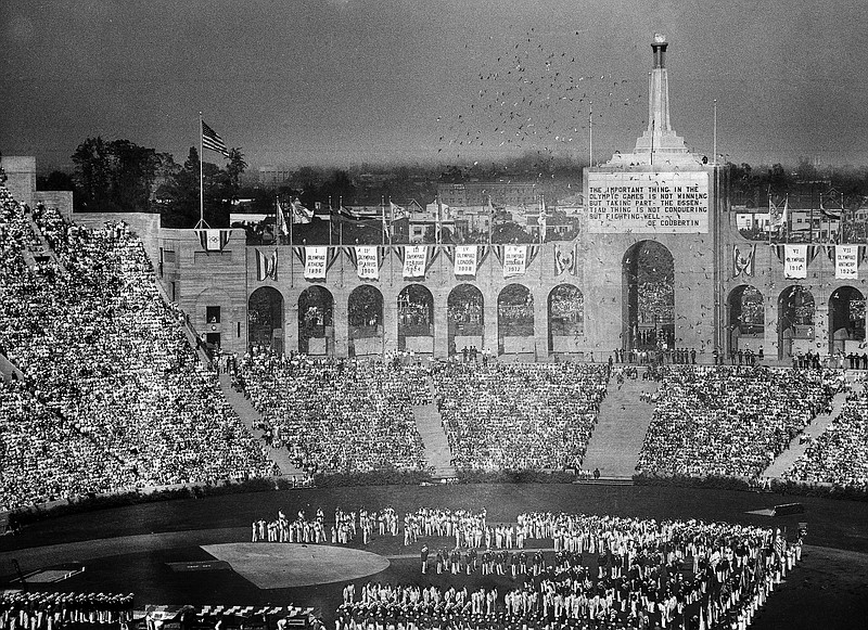 In this July 30, 1932, file photo, doves are released during opening ceremonies of the Tenth Olympiad at the Coliseum in Los Angeles. After a hastily called board meeting Wednesday, Aug. 12, 2015, U.S. Olympic Committee CEO Scott Blackmun said he was optimistic the committee could work out a plan to make Los Angeles, which hosted summer Olympics in 1932 and 1984, the U.S. bidder for the 2024 games. He hoped the decision would be official by the end of the month.(AP Photo)