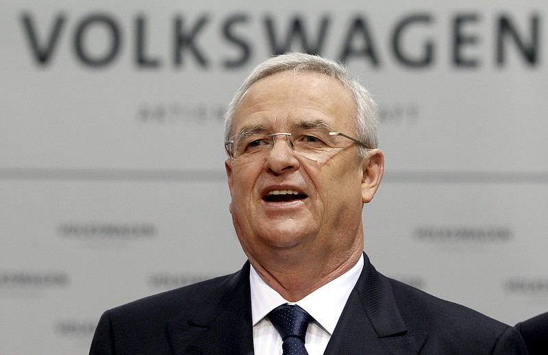 
              FILE - In this March 12, 2012 file picture Volkswagen CEO Martin Winterkorn talks to the media prior to the company's annual press conference in Wolfsburg, Germany. Top directors at German carmaker Volkswagen plan to give a two-year contract extension to CEO Martin Winterkorn, who emerged on top of a power struggle this year with company patriarch Ferdinand Piech. The automaker said Wednesday Sept. 2, 2015  that the executive committee of its supervisory board agreed to propose to the full board that Winterkorn be granted a contract through the end of 2018 at a meeting scheduled for Sept. 25. (AP Photo/Michael Sohn,file)
            