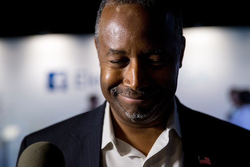 
Republican presidential candidate and retired neurosurgeon Ben Carson speaks to reporters after participating in a rapid fire Q&A with Facebook at their lounge at Quicken Loans Arena in Cleveland, Thursday, Aug. 6, 2015, before tonight's first Republican presidential debate.