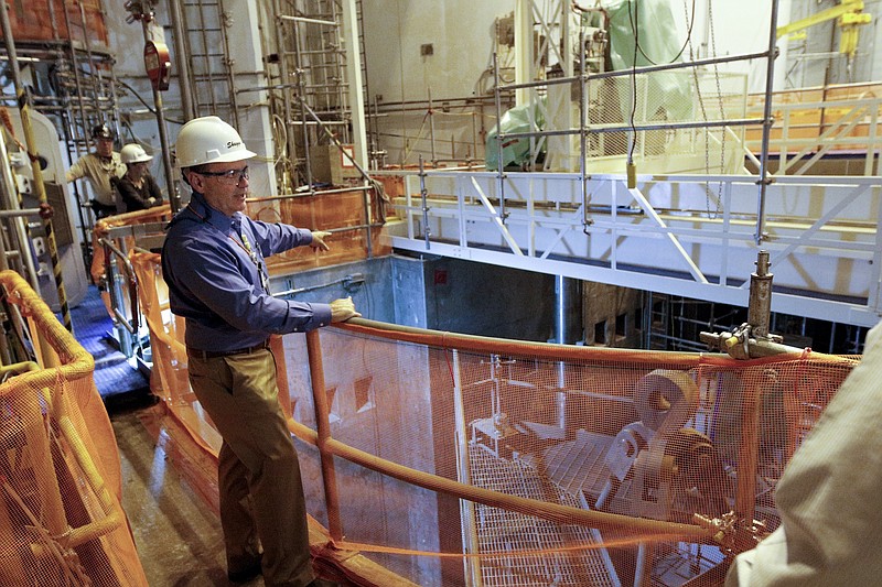 Senior vice president of operations and construction Mike Skaggs stands inside of the unit 2 reactor containment during a tour of TVA's Watts Bar nuclear plant Wednesday, April 29, 2015, in Spring City, Tenn. TVA plans for the nuclear plant's second reactor unit to come online by the end of the year.