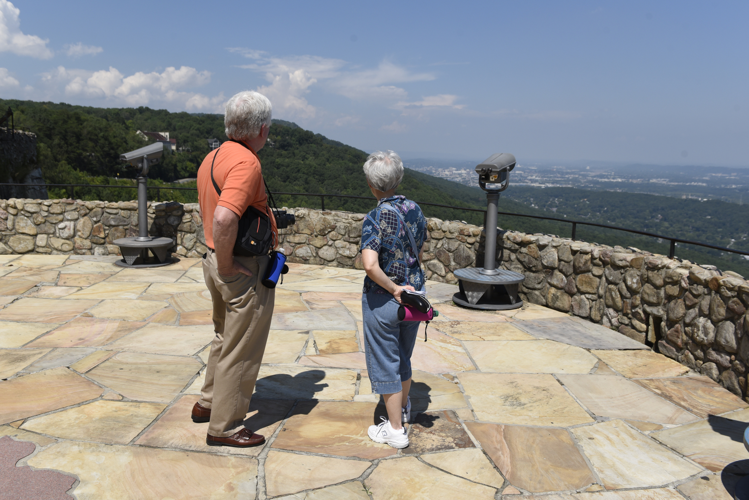 John and Sherry Britton, from Marietta, Ga., look off of the bluff at Lover's Leap at Rock City on Thursday, Sept. 3, 2015, in Lookout Mountain, Ga.