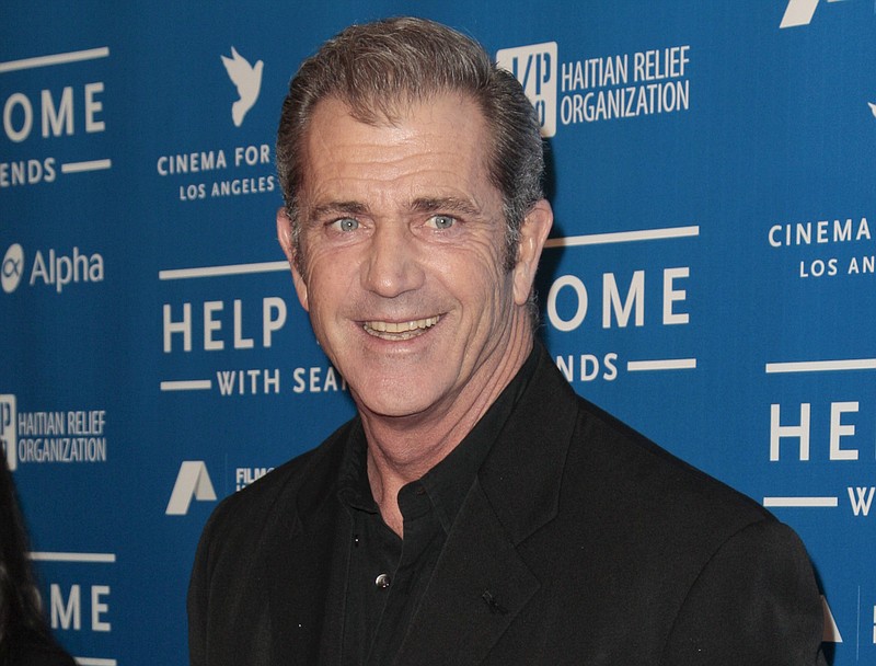 
              FILE - In this Jan. 14, 2012 file photo, Mel Gibson arrives at the Cinema for Peace benefit for the J/P Haitian Relief Organization in Beverly Hills, Calif. Police said Thursday, Sept. 3, 2015 in a statement they do not intent to charge Oscar-winning director Gibson over an allegation that he shoved and abused a newspaper photographer who snapped pictures of him and his new girlfriend in Sydney last month. The Daily Telegraph staff photographer Kristi Miller complained to police about the Aug. 23 altercation with Gibson after he and girlfriend Rosalind Ross were photographed leaving a movie in inner-suburban Paddington. (AP Photo/Jason Redmond, File)
            