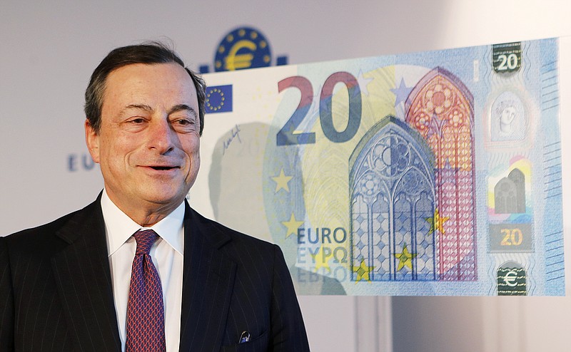 
              FILE - In this Tuesday, Feb. 24, 2015, file photo, Mario Draghi, president of the European Central Bank, stands next to a facsimile of the new 20 euro banknote in Frankfurt, Germany. Analysts are already talking about when and how the European Central Bank might extend its 1.1 trillion euro ($1.2 trillion) stimulus program that has been running for the past six months in an attempt to boost the modest recovery in the 19 countries that use the euro. (AP Photo/Michael Probst, File)
            