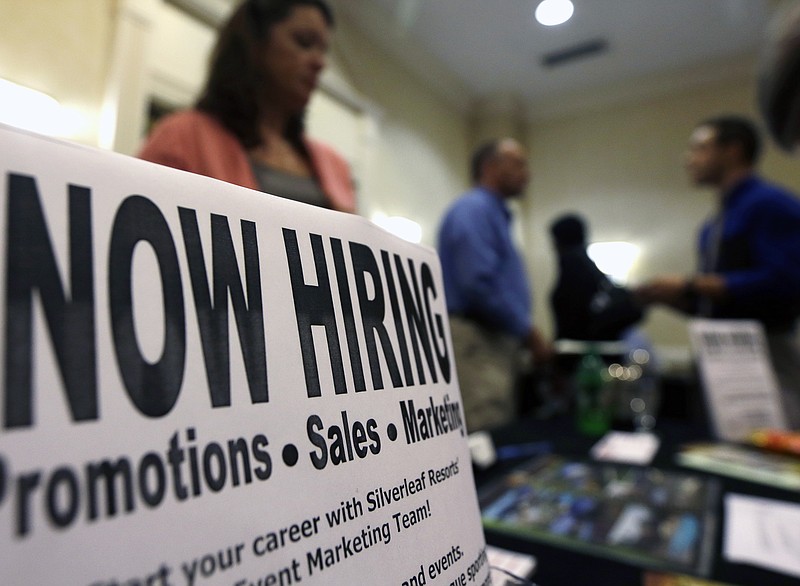 
              FILE - In this Thursday, Oct. 25, 2012, file photo, a sign attracts job-seekers during a job fair at the Marriott Hotel in Colonie, N.Y. The Labor Department reports on the number of people who applied for unemployment benefits during the week ending Aug. 29, 2015 on Thursday, Sept. 3, 2015. (AP Photo/Mike Groll, File)
            