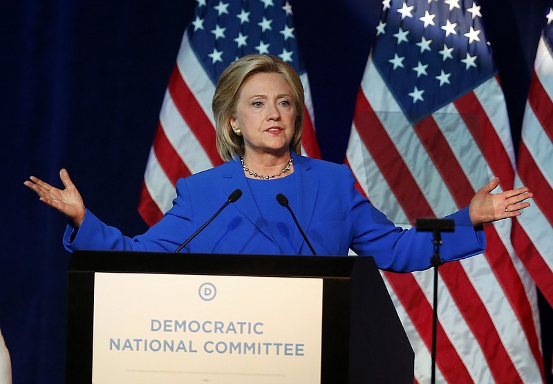 
              In this Aug. 28, 2015 file photo, Democratic presidential candidate, Hillary Rodham Clinton, addresses the summer meeting of the Democratic National Committee in Minneapolis. The State Department made public roughly 7,121 pages of Clinton's emails late Monday night, including 125 emails that were censored prior to their release because they contain information now deemed classified. The vast majority concerned mundane matters of daily life at any workplace: phone messages, relays of schedules and forwards of news articles.(AP Photo/Jim Mone)
            