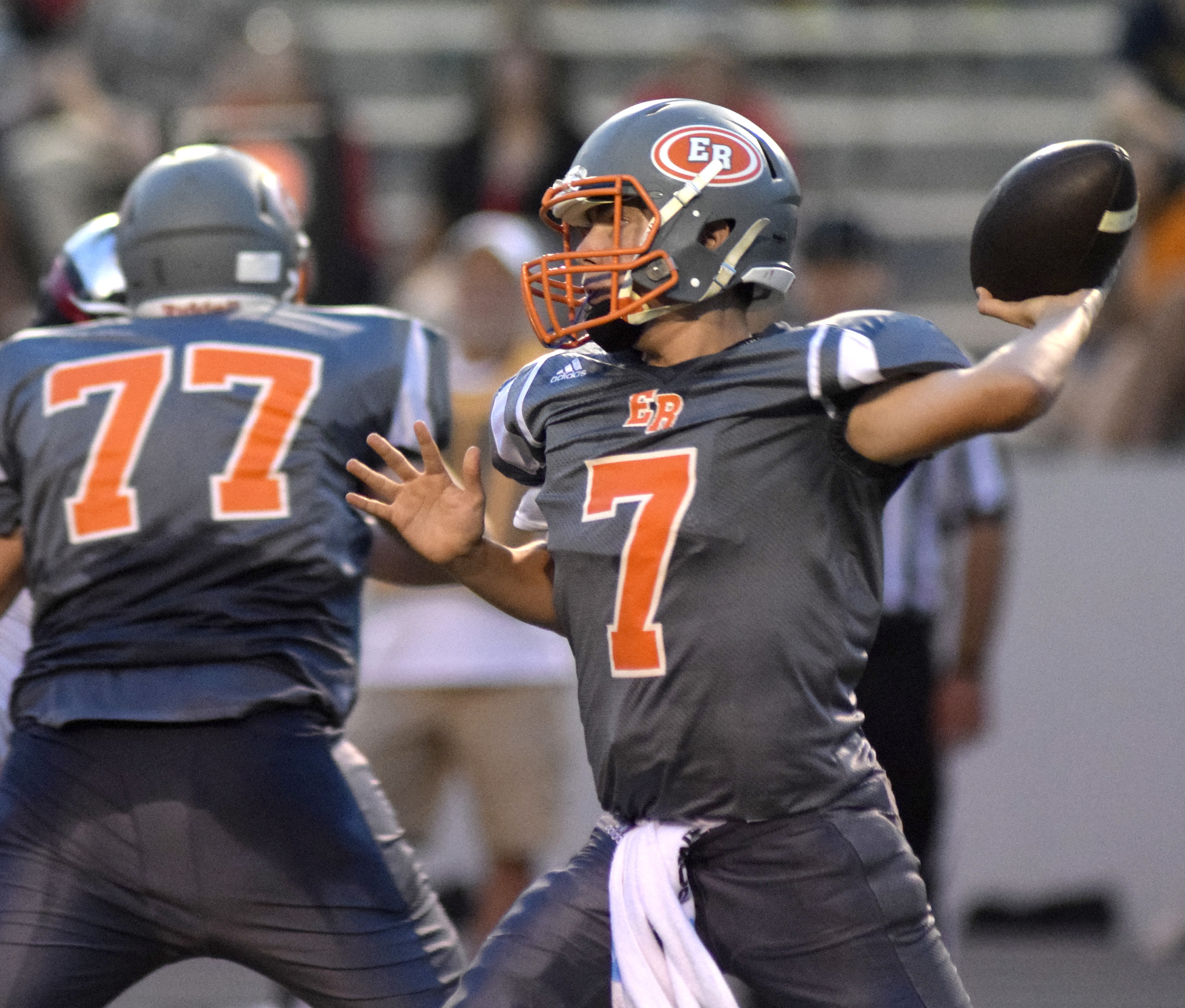 East Ridge quarterback Eric Bennett (7) passes.  The East Ridge Pioneers hosted the Signal Mountain Eagles at Baylor School in TSSAA football action on Friday September 4, 2015.