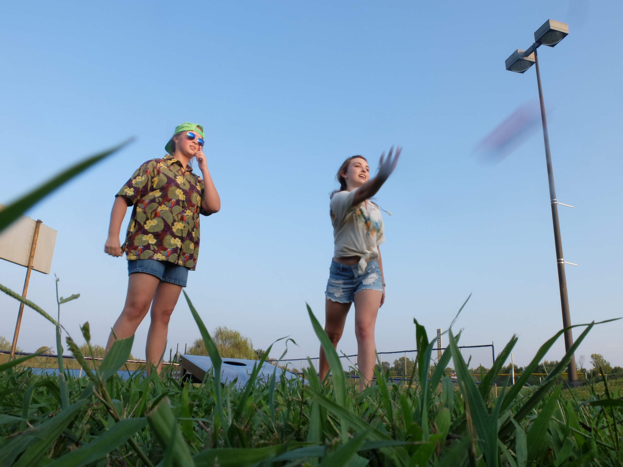Boyd-Buchanan students Eden Henderson, left, and Samantha Conn enjoy a game of toss with spirit squad members before the game with Brainerd.