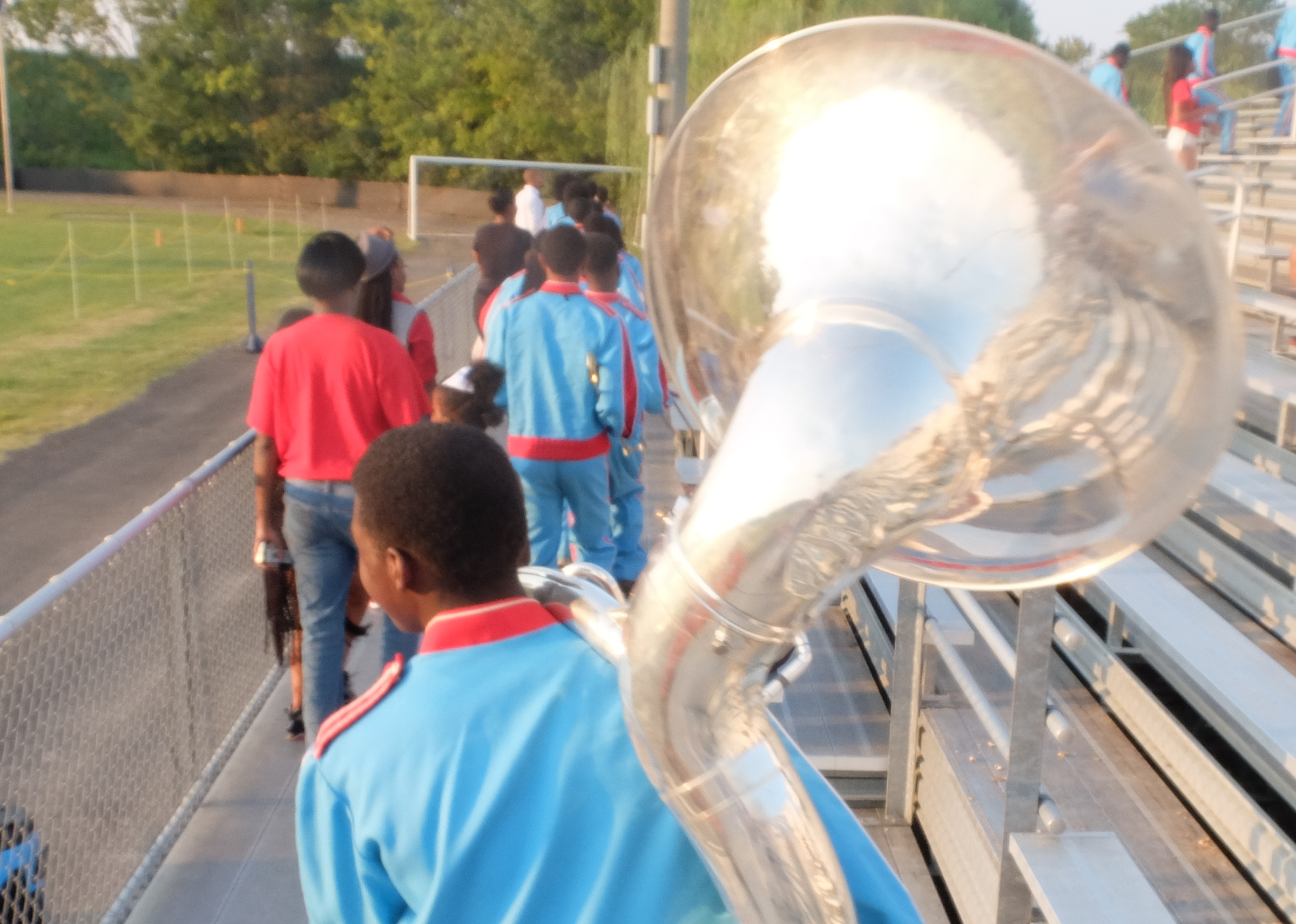 Brainerd Sousaphone player Joshua Locklin marches into the stands at Boyd-Buchanan at Friday night.