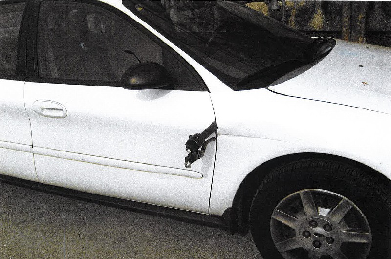 A city-owned car belonging to Valerie Radu at the Family Justice Center was found in a police parking lot with a motorcycle handle protruding from the side. Radu was cited for leaving the scene of an accident with injuries. 