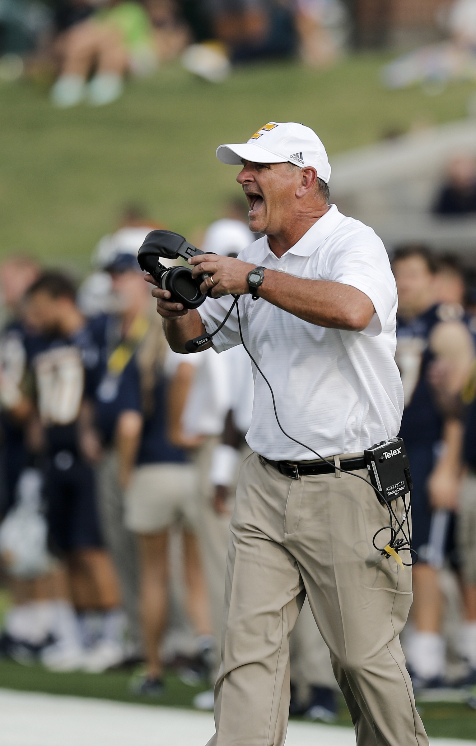 UTC coach Russ Huesman shouts to players during the Mocs' season-opener football game against Jacksonville State at Finley Stadium on Saturday, Sept. 5, 2015, in Chattanooga, Tenn.