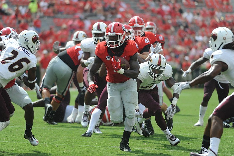 Georgia redshirt junior tailback Keith Marshall ran 10 times for 73 yards and two touchdowns Saturday in a 51-14 opening win over Louisiana-Monroe.
