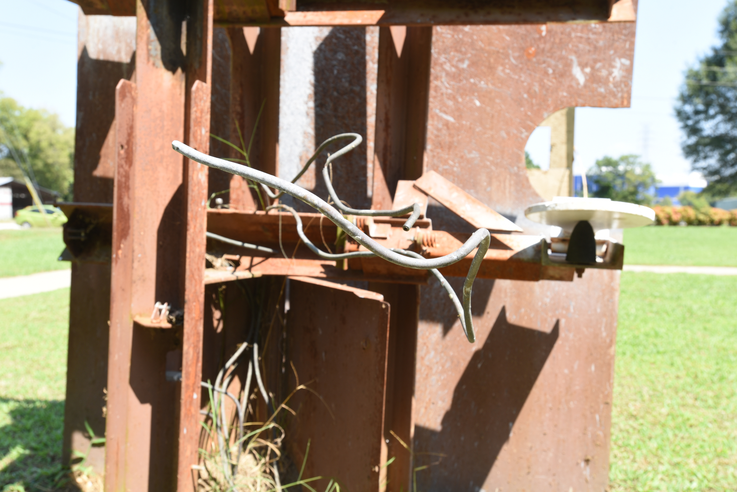 Wires hang loose on the back of a target Thursday, September 3, 2015 at the police firing range on Moccasin Bend Road.