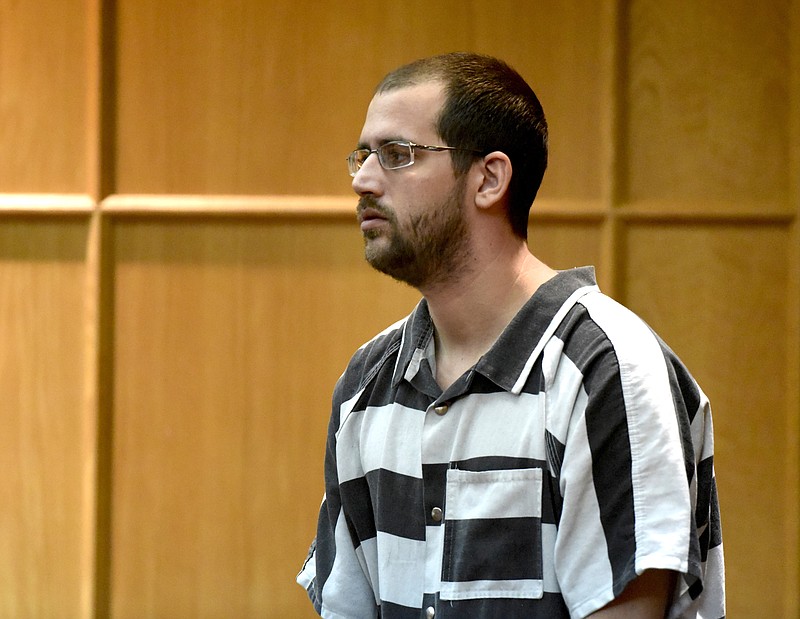 Ryan Epperson enters Judge Christie Mahn Sell's courtroom in General Sessions Court on Tuesday, Sept. 8, 2015, in Chattanooga, Tenn. Following his arrest on Aug. 19, he was bonded to the Grand Jury on Tuesday on multiple charges including drug possession, vandalism, theft and impersonation.