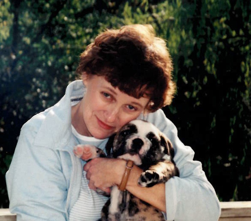 Deborah Steele, 58, is seen here in this undated family photo with her dog, Lulabelle. Steele was stabbed to death by her long-time boyfriend, Marcus Slattery, on May. 8. Slattery also shot and killed Lulabelle, then committed suicide. 