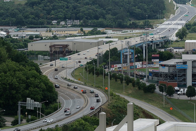 The downtown curves of U.S. Highway 27 are seen from the Republic Centre building Thursday, May 28, 2015, in Chattanooga, Tenn. The Republic Centre is the tallest building in Chattanooga.