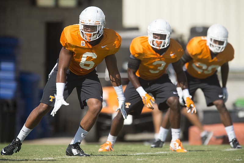 From left, Tennessee defensive backs Todd Kelly Jr. and Micah Abernathy and linebacker Cortez McDowell line up during special teams work at practice last month. Kelly was hospitalized most of last week but managed to play in the Volunteers' season-opening win over Bowling Green in Nashville.