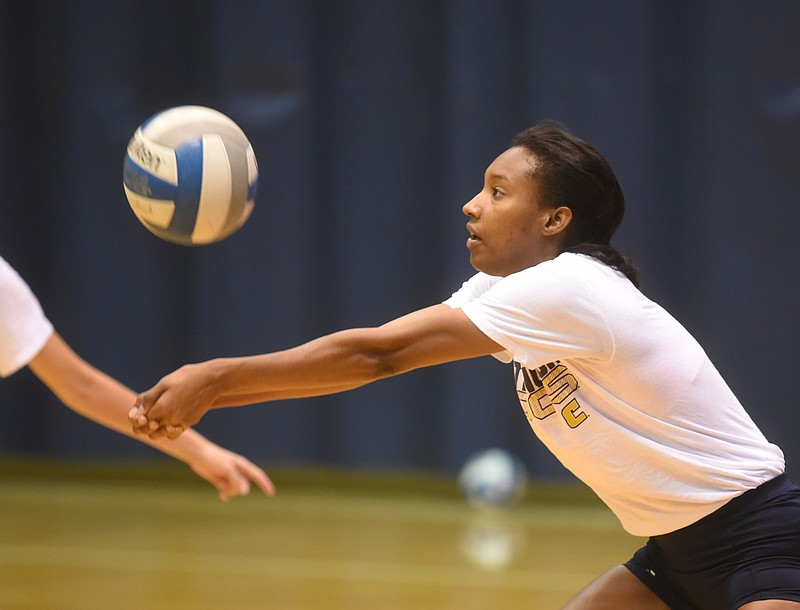 UTC volleyball player Briana Reid practicesat Maclellan Gym in this August 26, 2015, file photo.