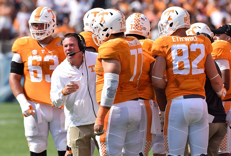Tennessee head coach Butch Jones gets the offense organized in Nashville in this Sept. 5, 2015, file photo.