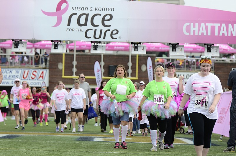 Race for the Cure participants cross the finish line at the 2014 event. Race for the Cure returns to McKenzie Arena today after previously being held at Finley Stadium. Individuals and teams may still sign up this morning beginning at 11 a.m. Registration closes at 1:45 p.m. The 5K race and one-mile walk start at 2 p.m.