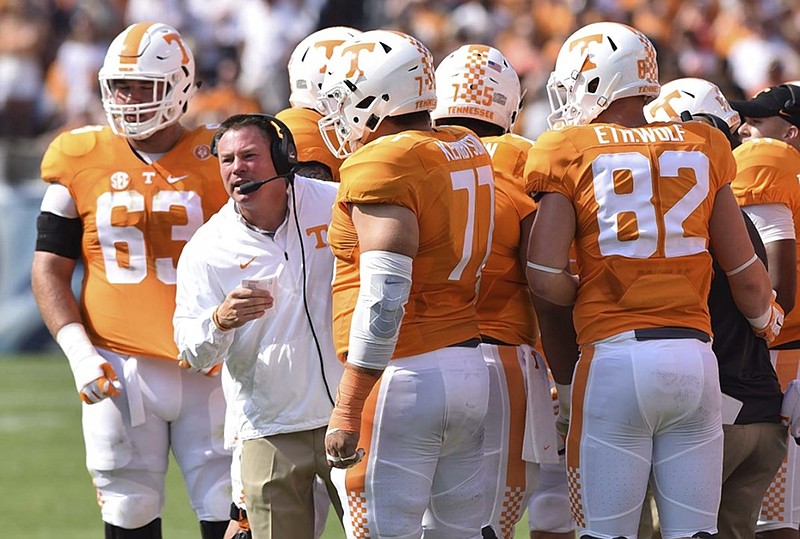 Tennessee coach Butch Jones speaks to the offense during this past Saturday's season opener against Bowling Green at Nissan Stadium in Nashville. The Volunteers' offensive line expects a tougher test Saturday when 23rd-ranked Tennessee host No. 19 Oklahoma at Neyland Stadium in Knoxville.