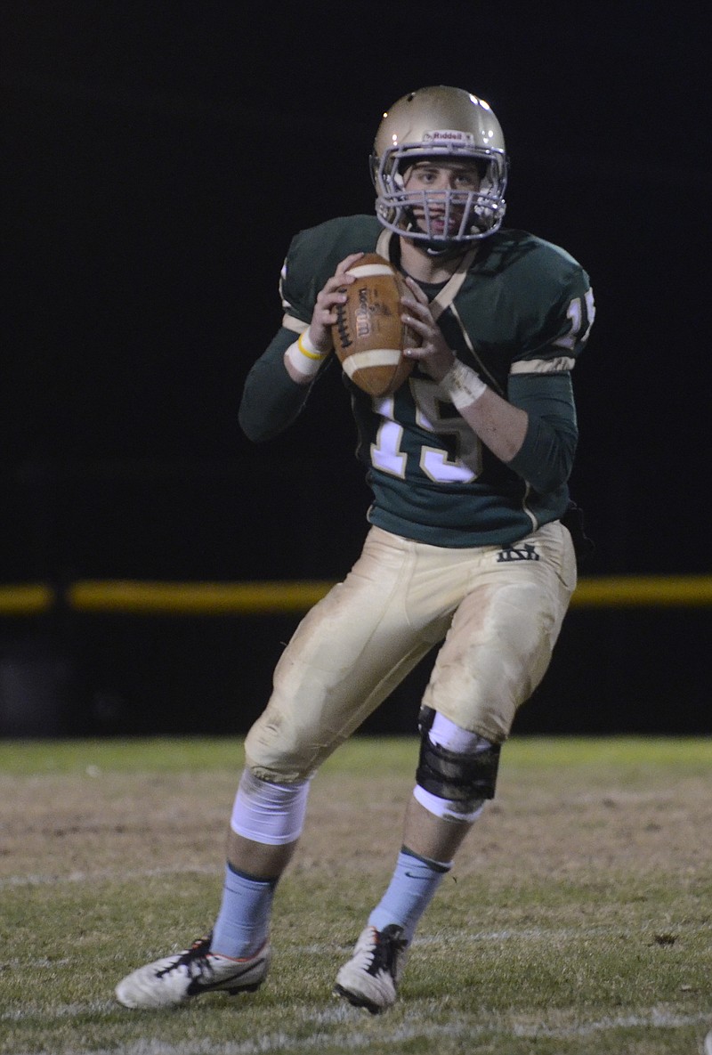 Nov 8, 2013--Notre Dame quarterback Alex Darras checks out the field before passing Friday at Notre Dame.