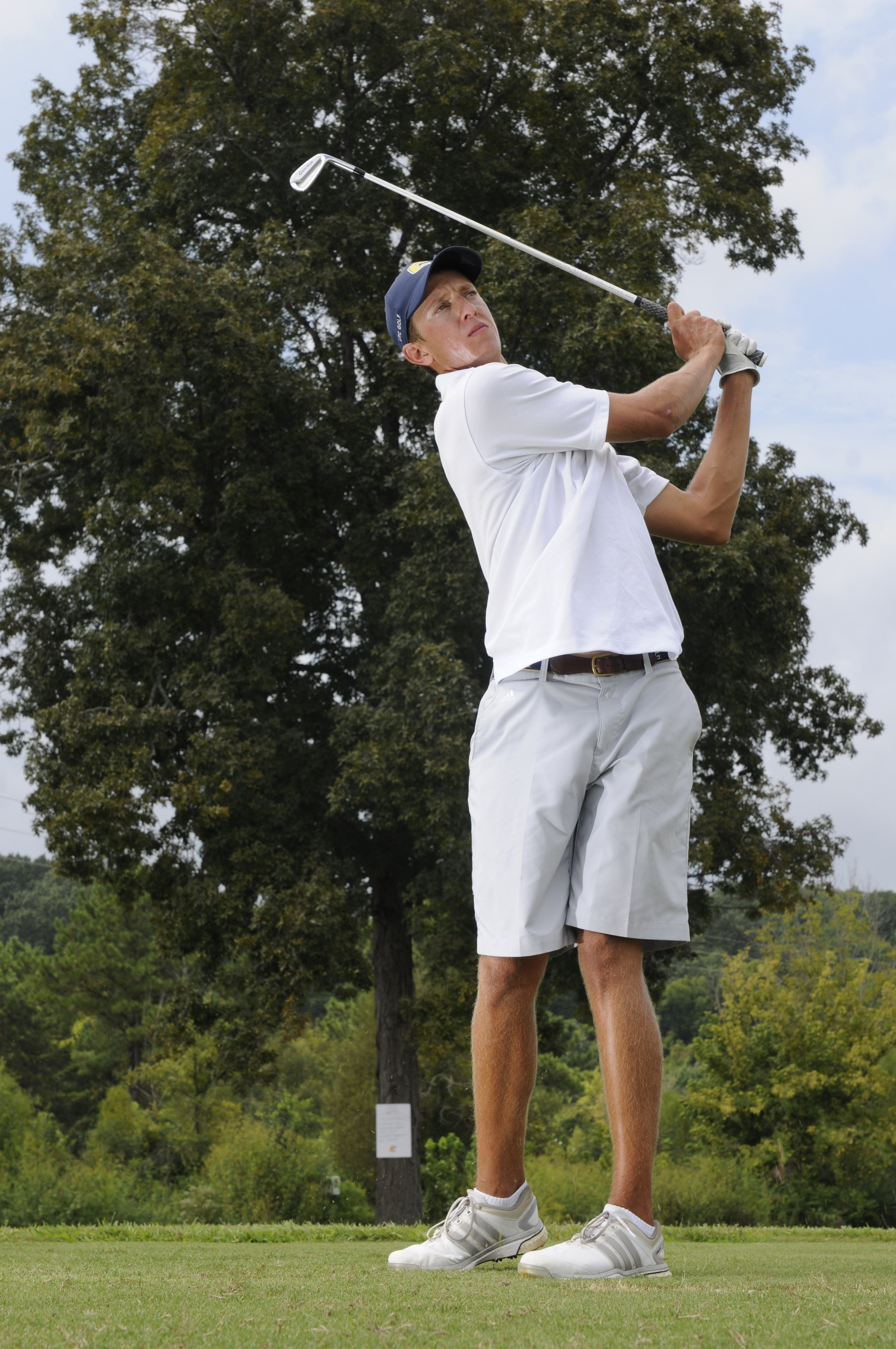 Wes Gosselin hits short iron shots Wednesday during practice at the UTC Golf center on Hickory Valley Road.