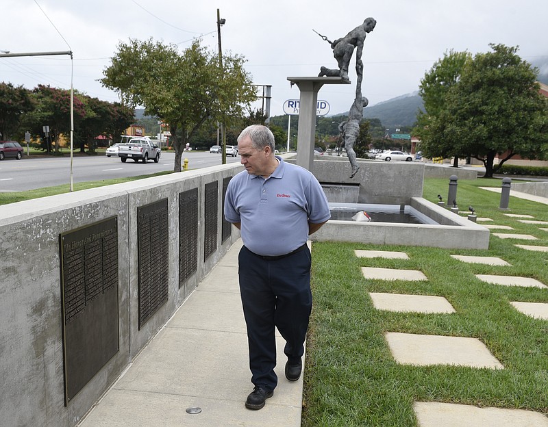 Bill Giorgis, vice president of TT Publications, looks at the Wall of the Fallen at the International Towing and Recovery Museum and Hall of Fame on Thursday, Sept. 10, 2015, in Chattanooga, Tenn. This weekend at the Tennessee Tow Show, dozens more names will be added to the wall that honors members of the towing industry who were killed in the line of duty.