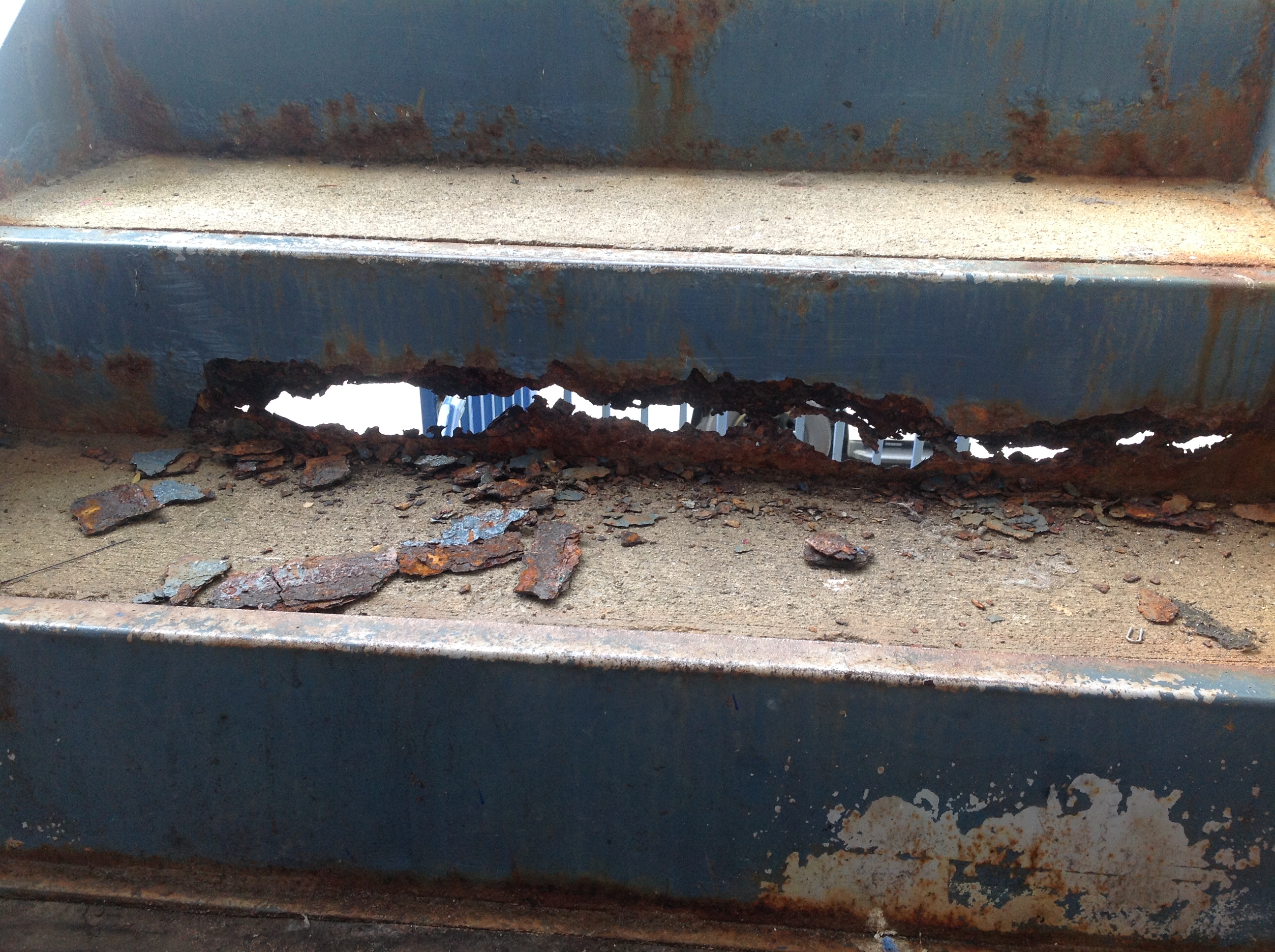 Stairs of a building in Superior Creek Lodge crumble.