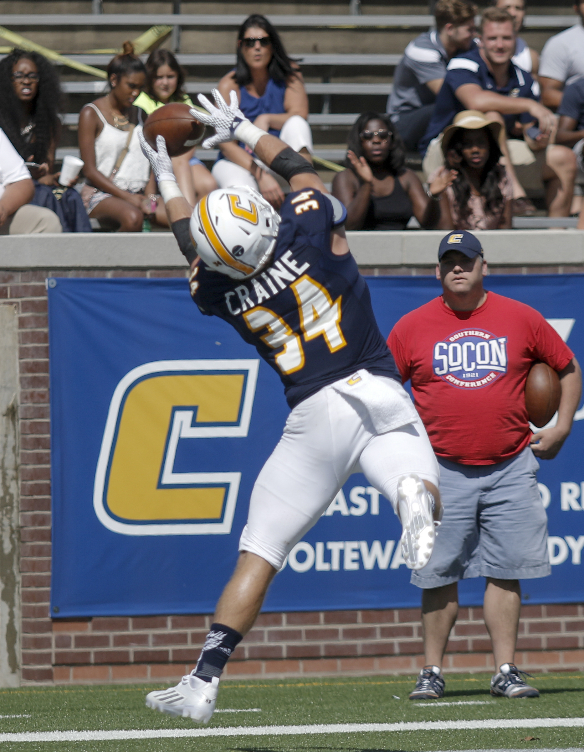 UTC running back Derrick Craine catches a pass in the end zone for a touchdown during the Mocs' football game against the Mars Hill Lions at Finley Stadium on Saturday, Sept. 12, 2015, in Chattanooga, Tenn. UTC won 44-34.