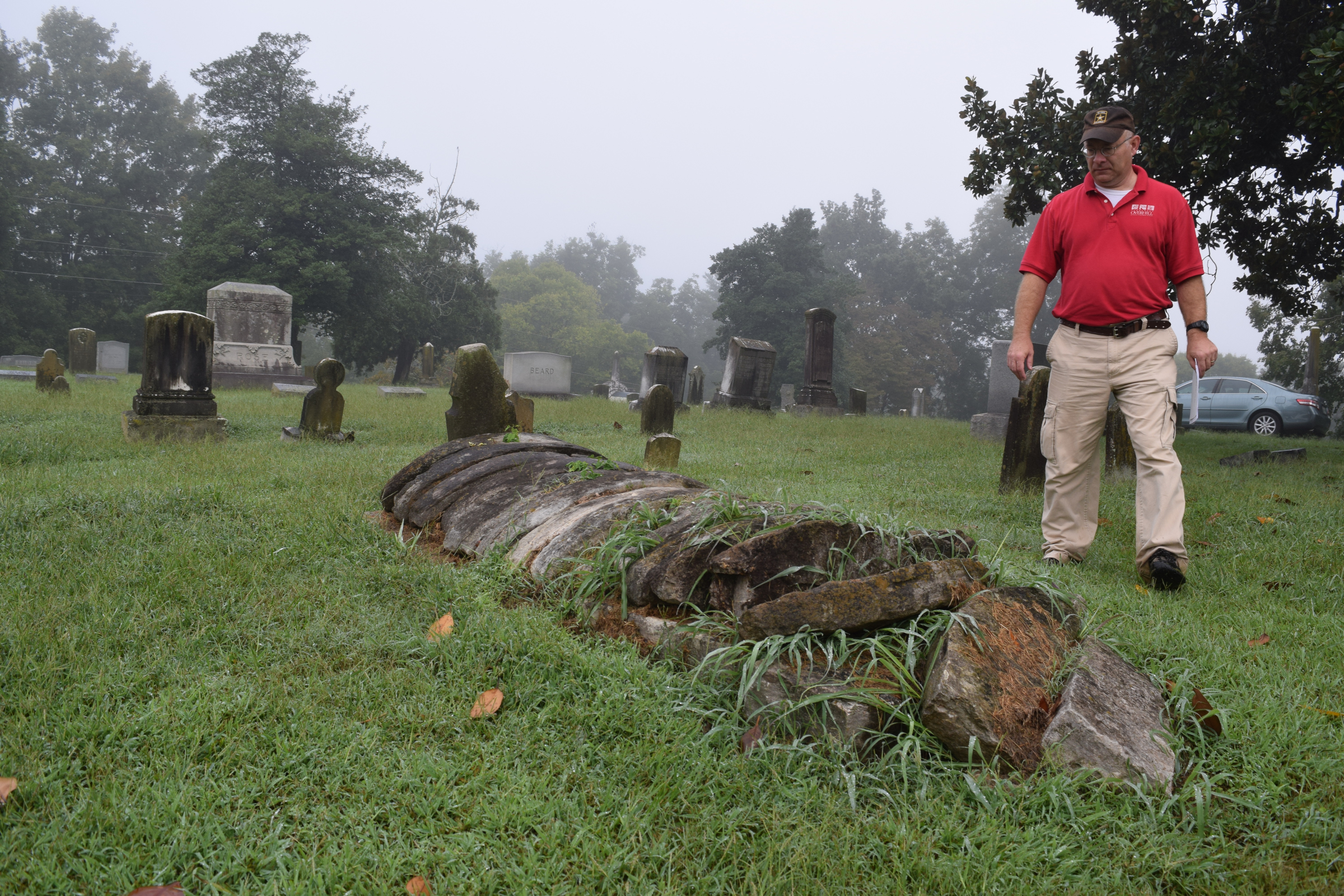 Tennessee Overhill Heritage Association executive director Gerald Hodge talks about a project to document the oddest and most unusual graves and markers in McMinn, Monroe and Polk counties. Here, Hodge talks about the looted grave of what was could be a Cherokee or Creek chief who was buried at Cedar Grove Cemetery in Athens, Tenn., around 1840.