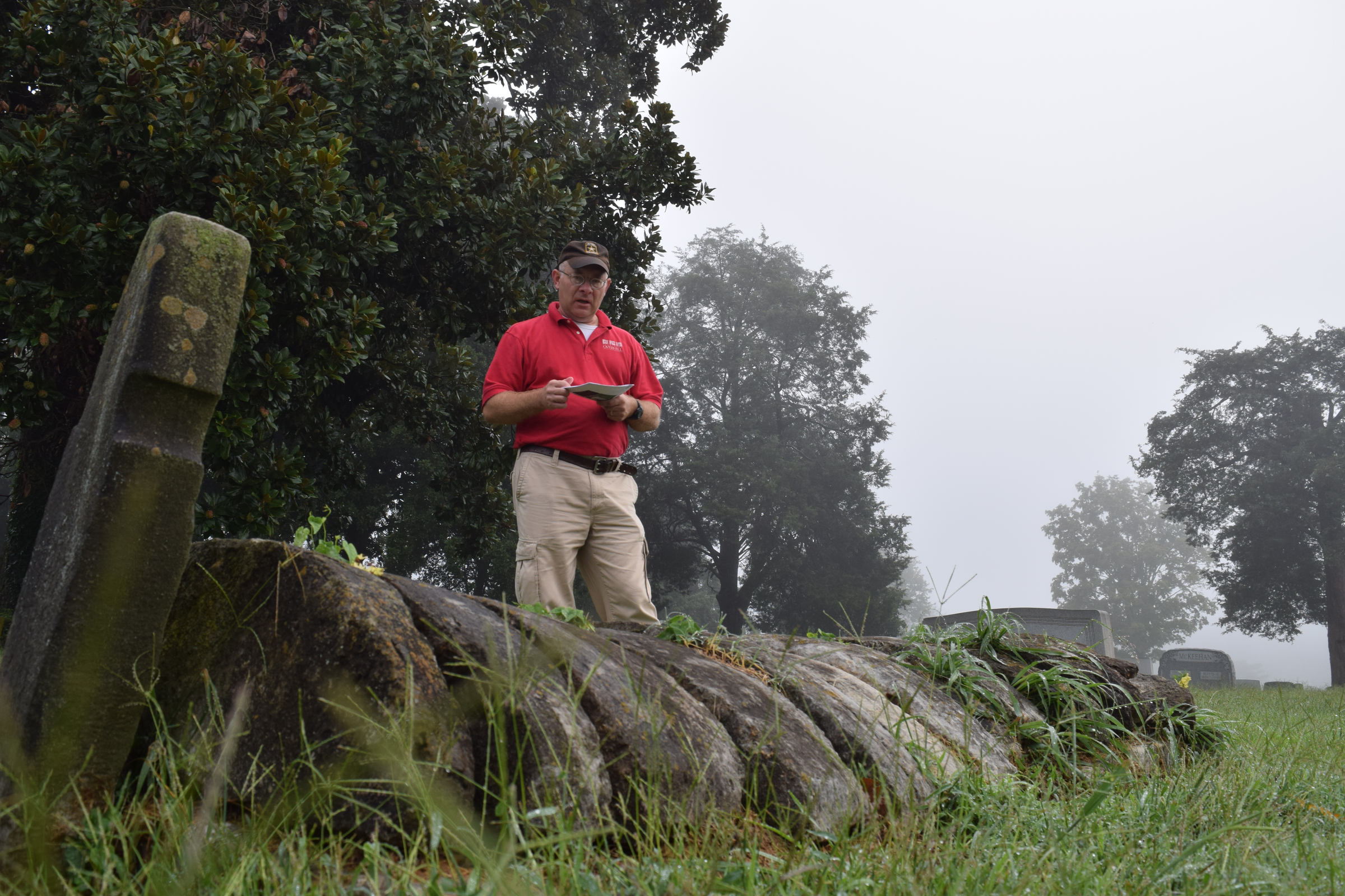 Tennessee Overhill Heritage Association executive director Gerald Hodge talks about a project to document the oddest and most unusual graves and markers in McMinn, Monroe and Polk counties. Here, Hodge talks about the looted grave of what was could be a Cherokee or Creek chief who was buried at Cedar Grove Cemetery in Athens, Tenn., around 1840.