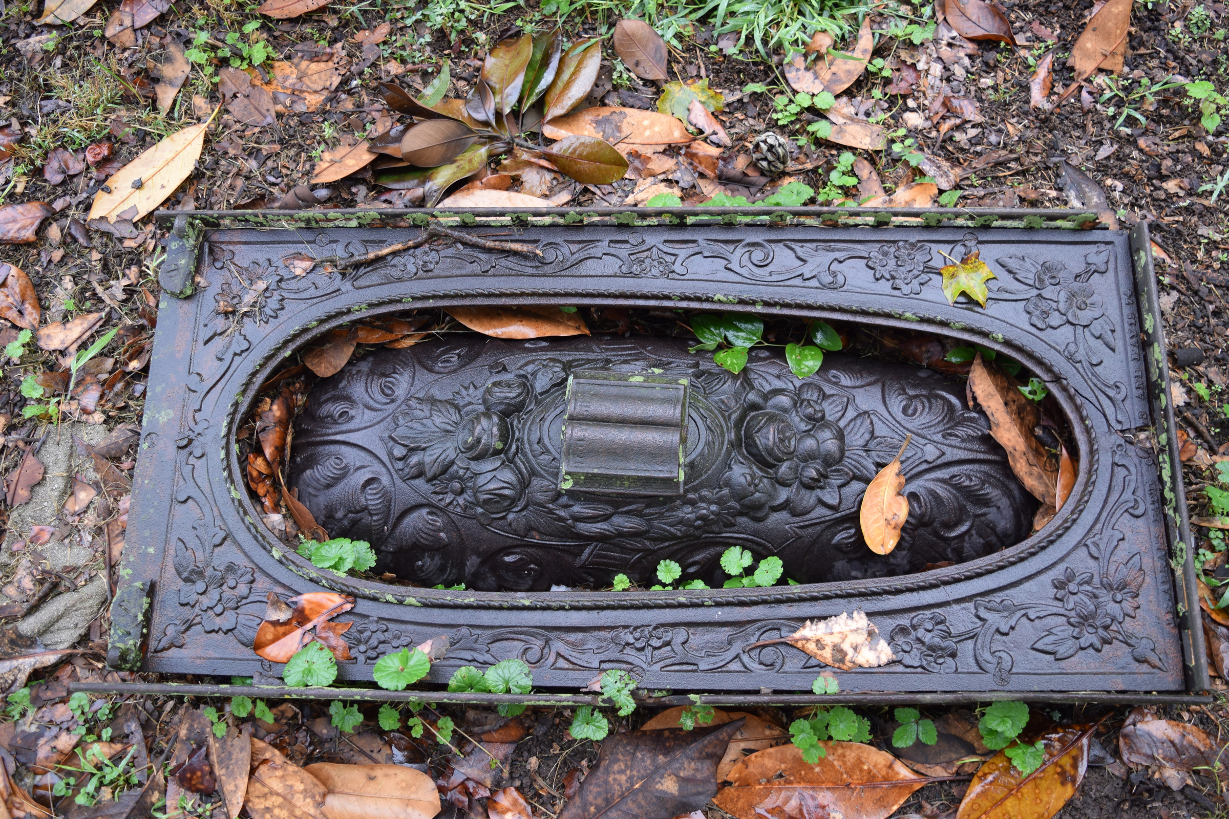 The grave of a child is designated with a cast iron marker at Cedar Grove Cemetery in Athens, Tenn. The Tennessee Overhill Heritage Association is conducting a study of odd and unusual graves in McMinn, Monroe and Polk counties.