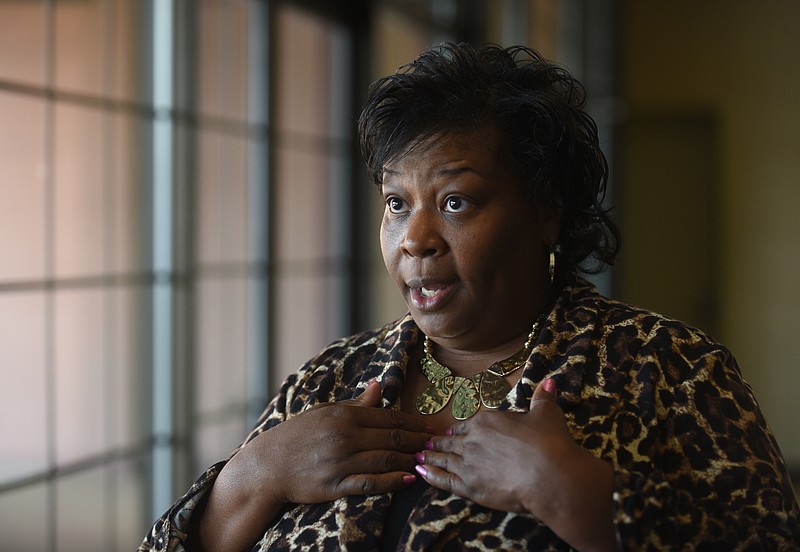 Dr. Elenora Woods, president of the Chattanooga Hamilton County branch of the NAACP, talks Saturday at the NAACP 8th Annual Criminal Justice Seminar at the Choo Choo.