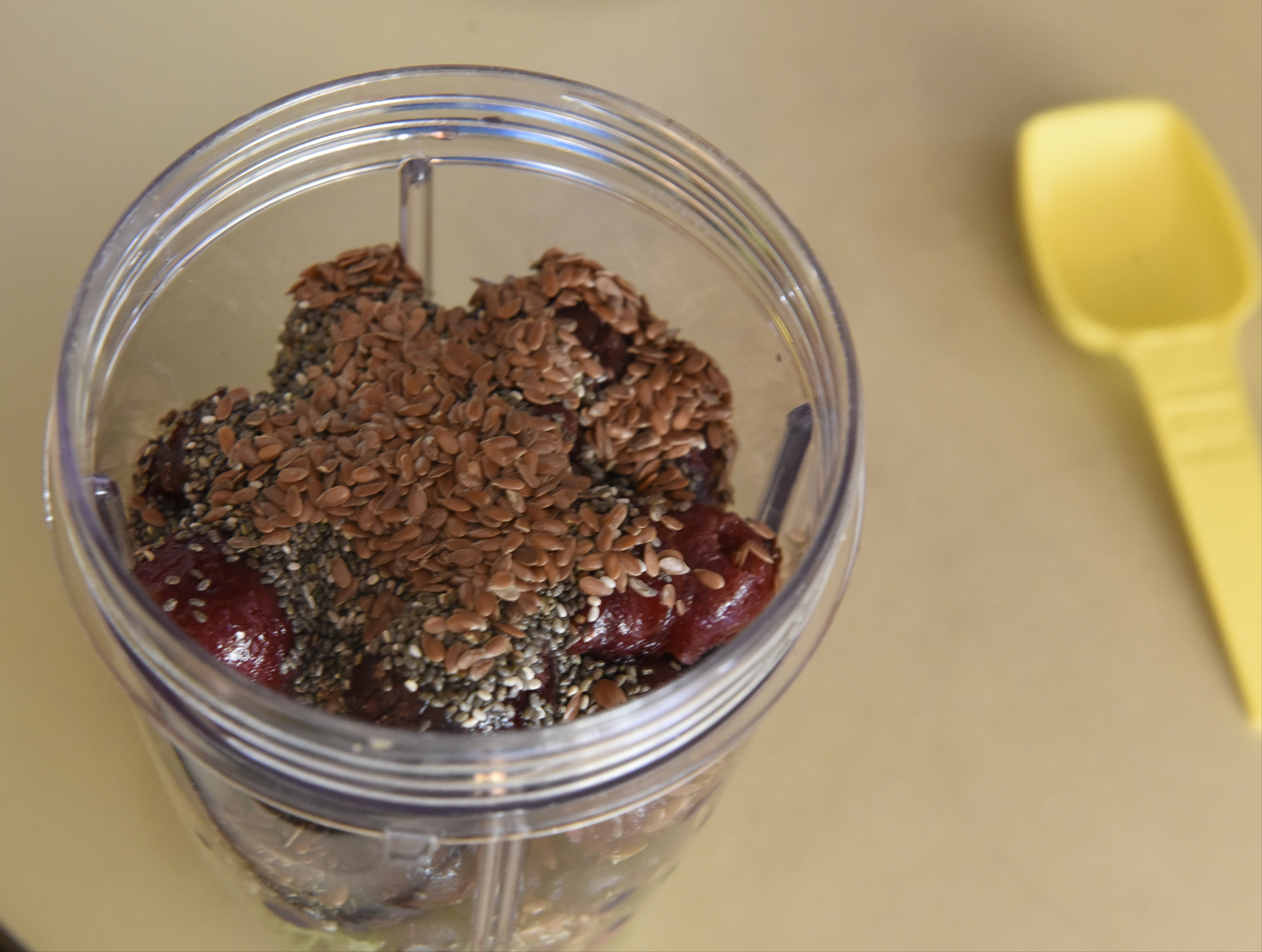 Sharon Thomas uses flax seed, chia seed, dark sweet cherries, blueberries, yogurt, and a kale medley as she makes a smoothie in her home in the East Brainerd community on Sunday, Sept. 13, 2015, in Chattanooga, Tenn.