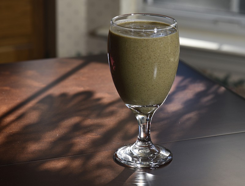 Sharon Thomas made this smoothie using strawberry, banana, peanut butter, chia seed, flax seed, water and a kale medley, photographed in her home in the East Brainerd community on Sunday, Sept. 13, 2015, in Chattanooga, Tenn.