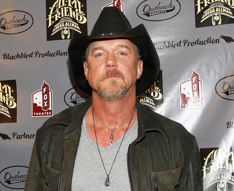 FILE - This Jan. 10, 2014 file photo shows Trace Adkins at the All My Friends: Celebrating The Songs and Voice of Gregg Allman tribute in Atlanta. Adkinsí publicist confirmed to The Associated Press on Wednesday, Jan. 15, 2014 that the singer entered rehab after consuming alcohol during the Country Cruising cruise. The 52-year-old ìCelebrity Apprenticeî winner has canceled the remainder of his performances during the weeklong cruise that wraps up Sunday after stops in Jamaica, Grand Cayman and Mexico. (Photo by Dan Harr/Invision/AP, FIle)